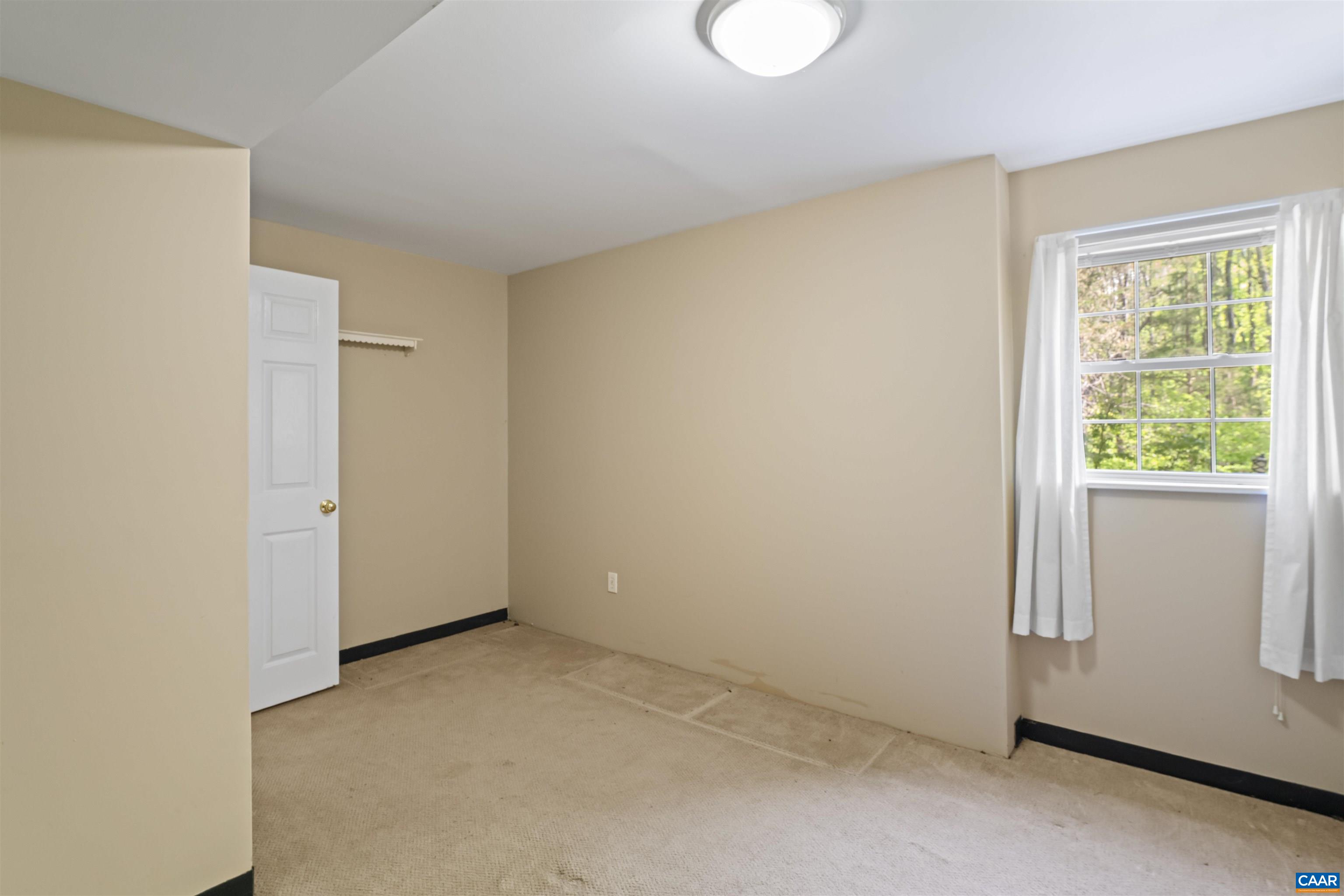 751 Jonquil Road Ruckersville, VA 22968 - Photo 34 of 35 a view of a room that has a window in it