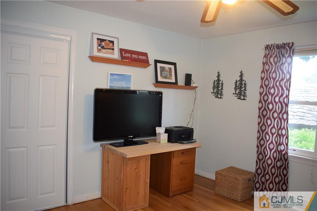 275 Friendship Road Cranbury, NJ 08512 - Photo 11 of 23 a room with furniture and flat screen tv