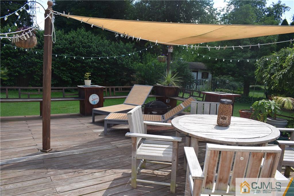 275 Friendship Road Cranbury, NJ 08512 - Photo 20 of 23 a patio view with a garden and entertaining space