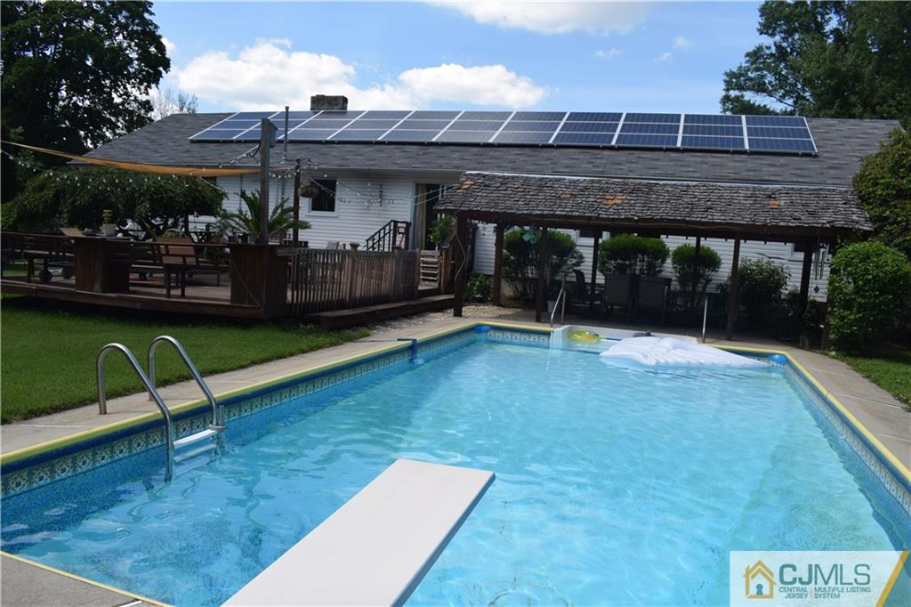 275 Friendship Road Cranbury, NJ 08512 - Photo 23 of 23 a view of a swimming pool with a patio