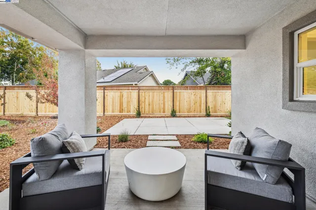 a living room with a couch and a large window