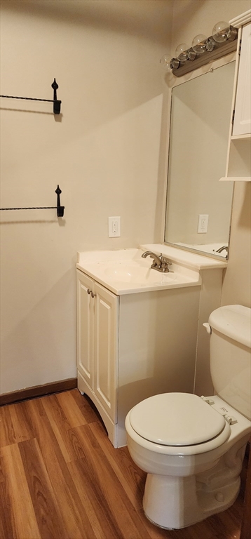 1 Samoset Avenue, Unit H Mansfield, MA 02048 - Photo 3 of 7 a bathroom with a sink a toilet and a shower