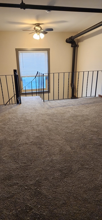 1 Samoset Avenue, Unit H Mansfield, MA 02048 - Photo 6 of 7 a view of staircase with white walls