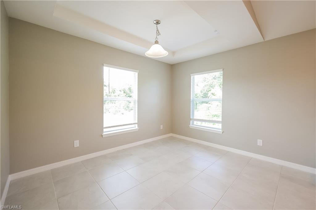 1218 Beaver Street East Lehigh Acres, FL 33974 - Photo 4 of 15 a view of an empty room with a window