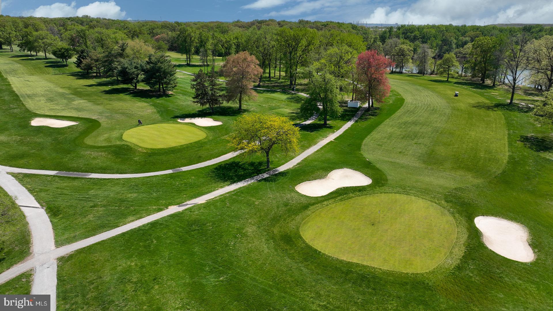 1824 John Stricker Avenue Baltimore, MD 21222 - Photo 11 of 44 a view of a golf course with a swimming pool
