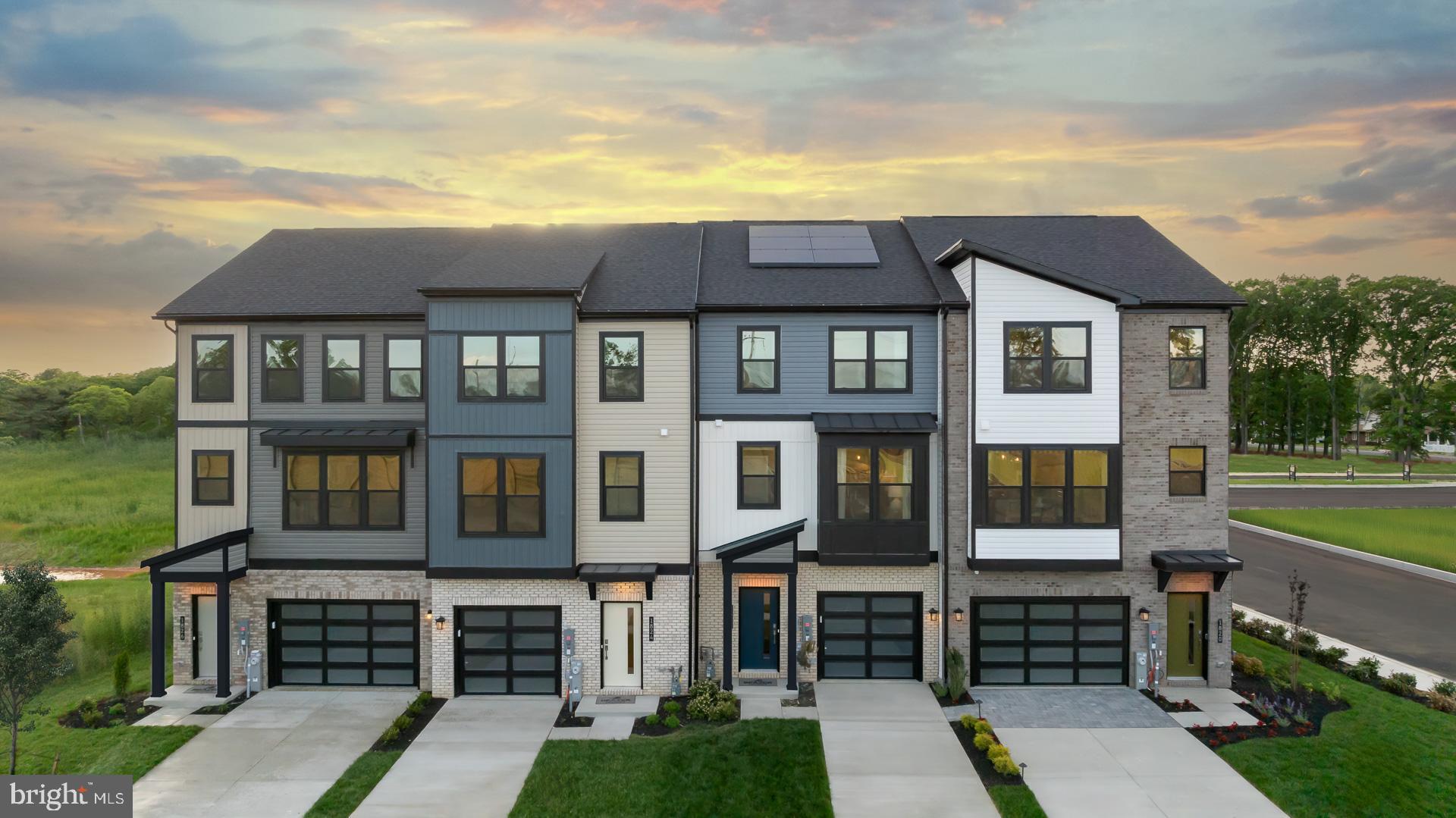 1824 John Stricker Avenue Baltimore, MD 21222 - Photo 30 of 44 a front view of a house with a yard