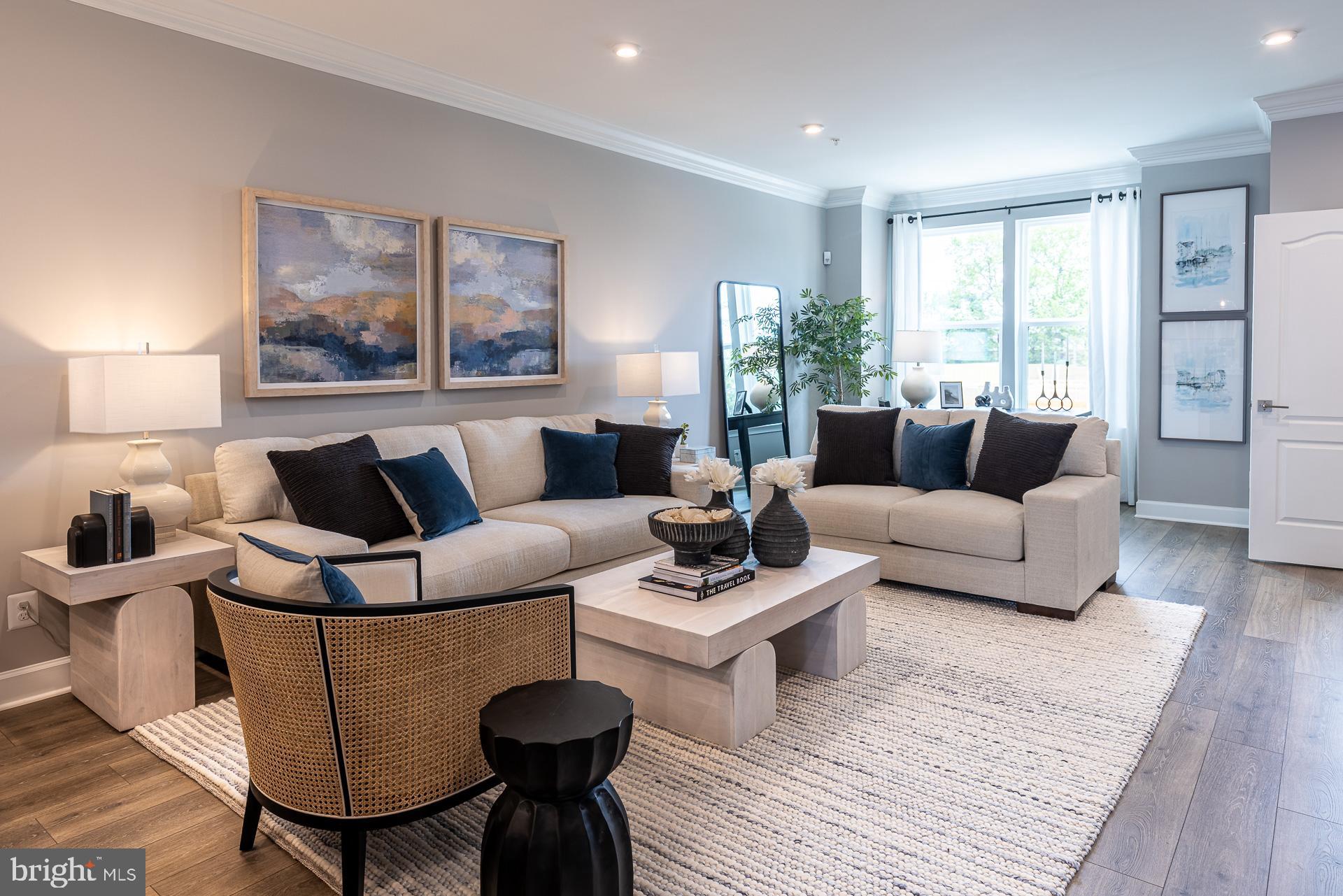 1824 John Stricker Avenue Baltimore, MD 21222 - Photo 3 of 44 a living room with furniture and a large window