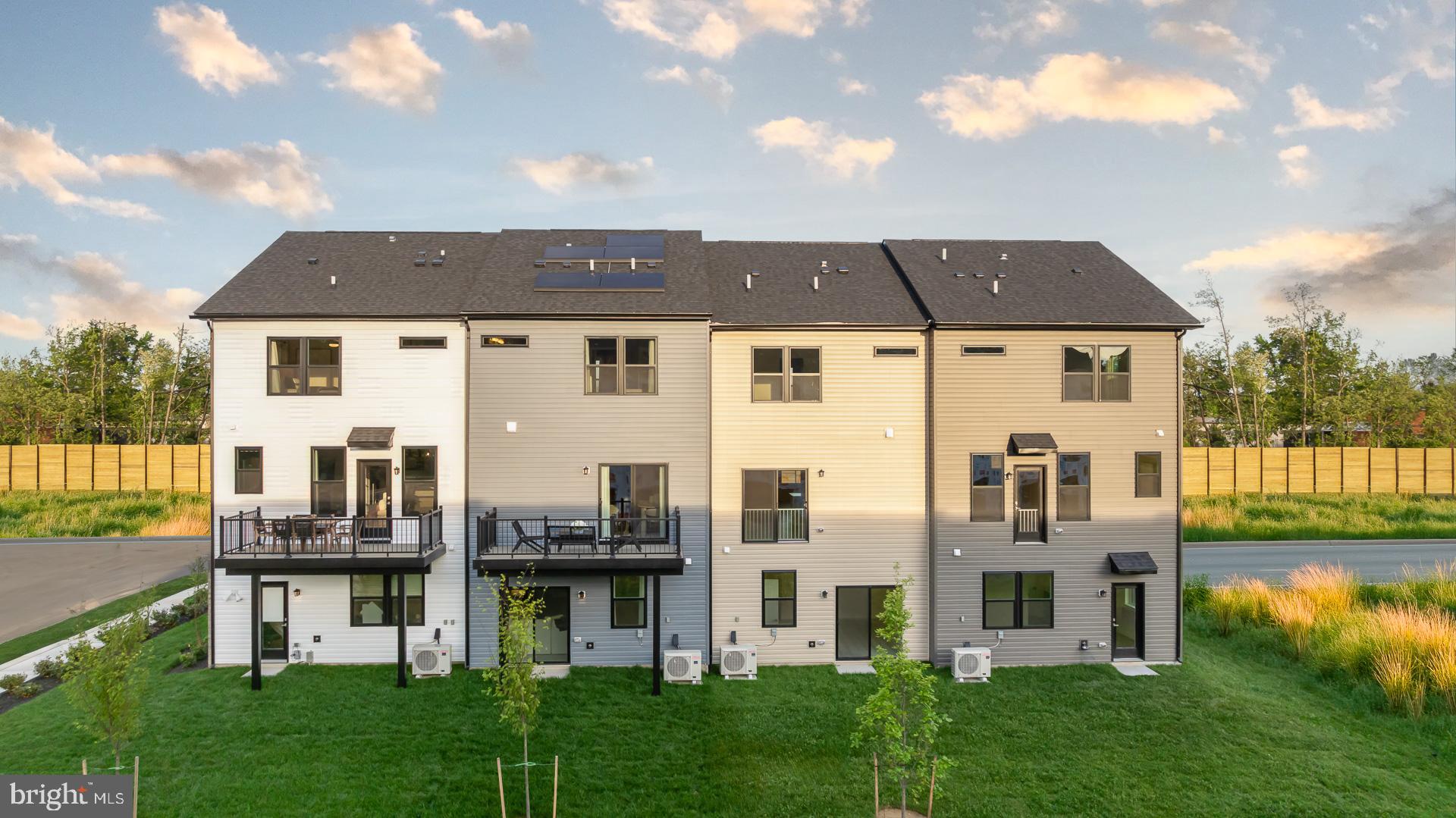 1824 John Stricker Avenue Baltimore, MD 21222 - Photo 9 of 44 a view of a house with a garden and lake view