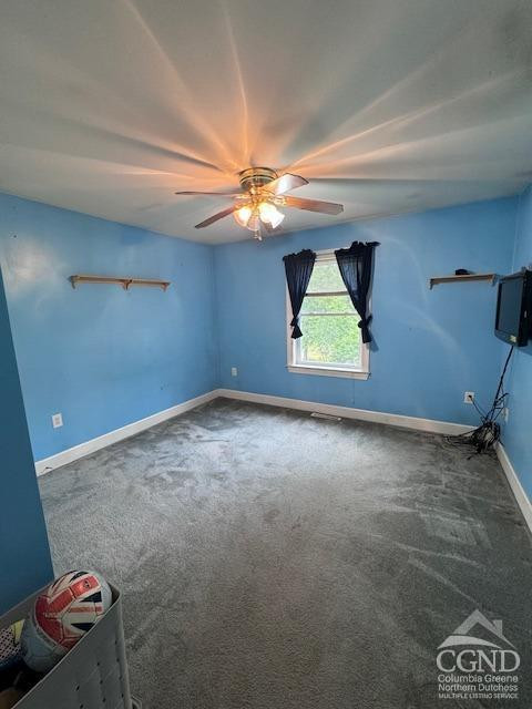 114 La Corte Road Catskill, NY 12414 - Photo 12 of 29 en empty room with windows and ceiling fan