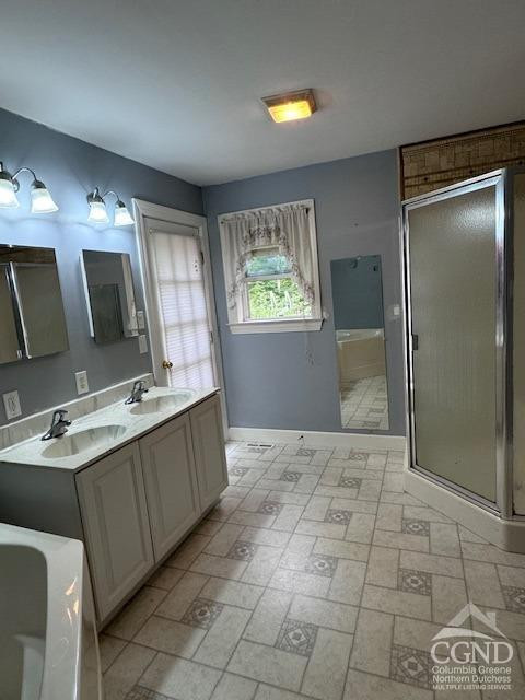 114 La Corte Road Catskill, NY 12414 - Photo 20 of 29 a bathroom with a sink and a mirror