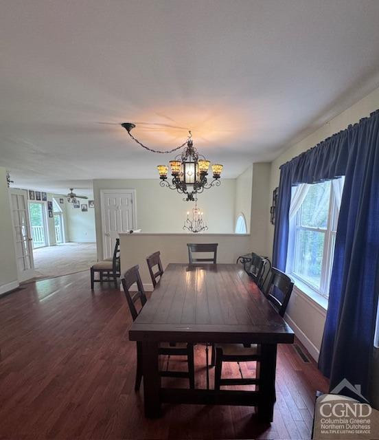 114 La Corte Road Catskill, NY 12414 - Photo 3 of 29 a view of a dining room with furniture and wooden floor