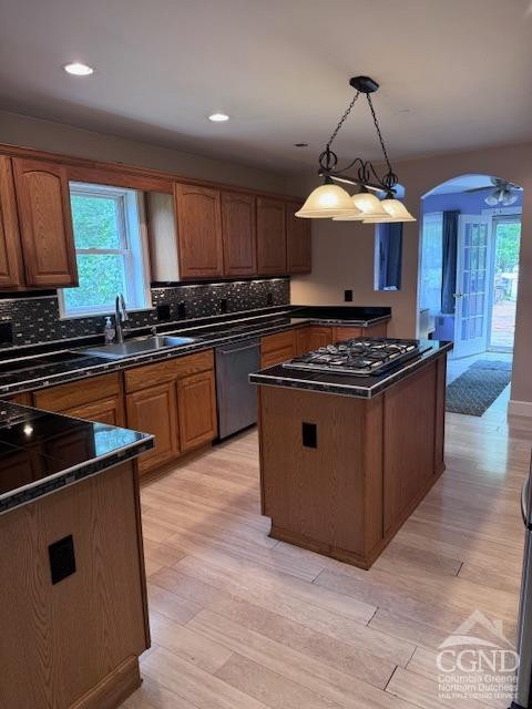 114 La Corte Road Catskill, NY 12414 - Photo 5 of 29 a kitchen with granite countertop a sink a stove and a wooden floors