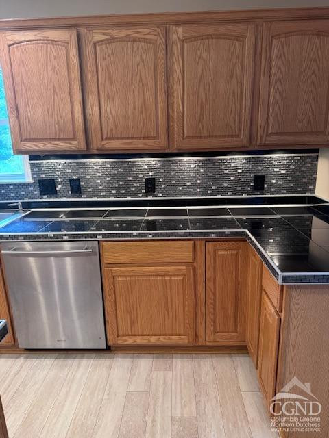 114 La Corte Road Catskill, NY 12414 - Photo 7 of 29 a kitchen with granite countertop wood cabinets and stainless steel appliances