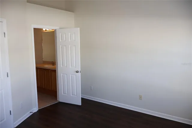 an empty room with a hallway