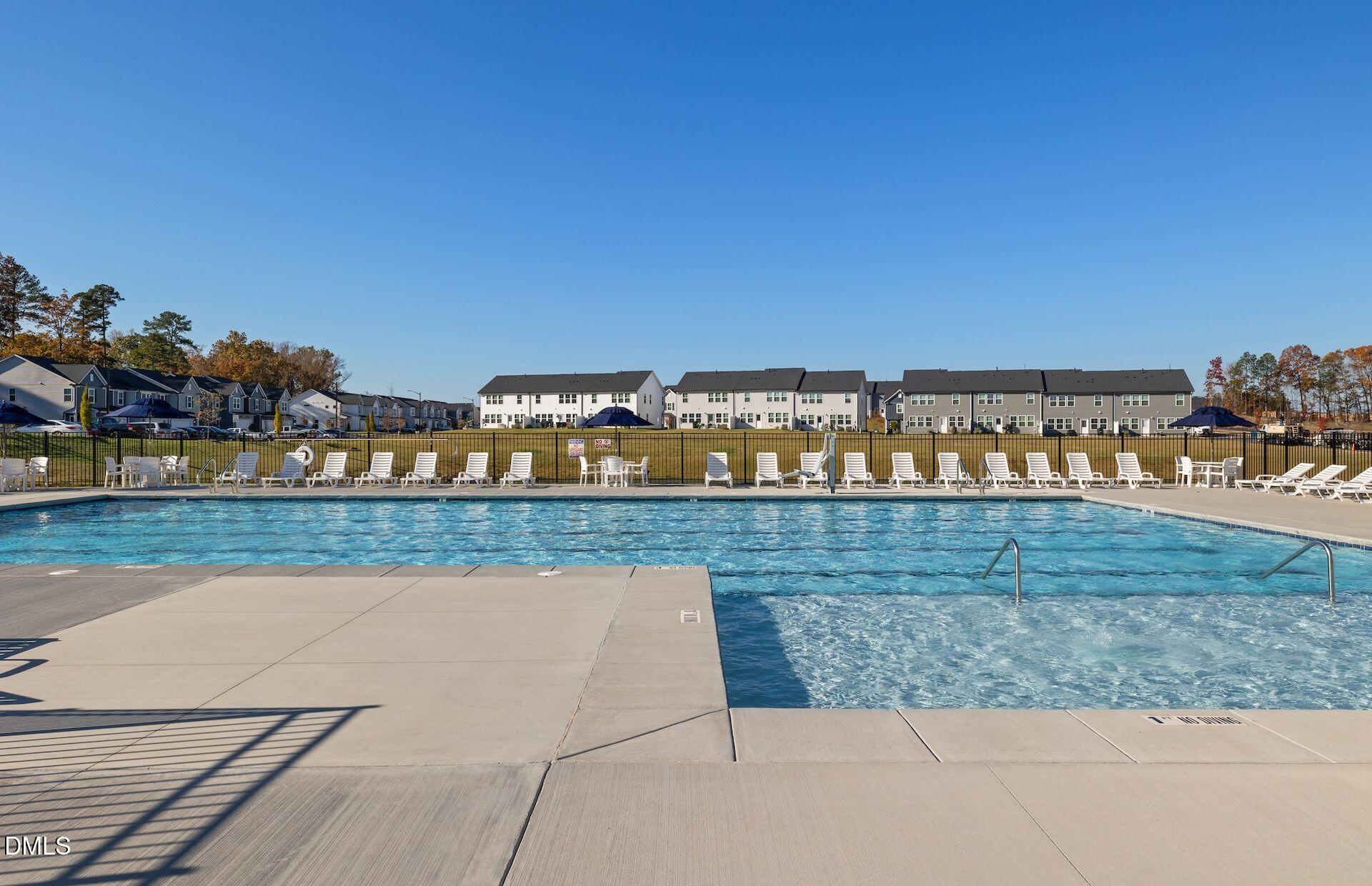 5003 Reader Way Durham, NC 27703 - Photo 23 of 30 a view of swimming pool and lake