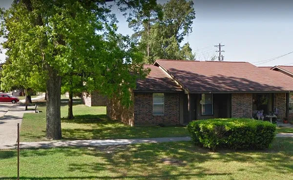 a view of a house with garden