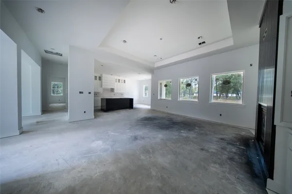 a view of empty room with windows
