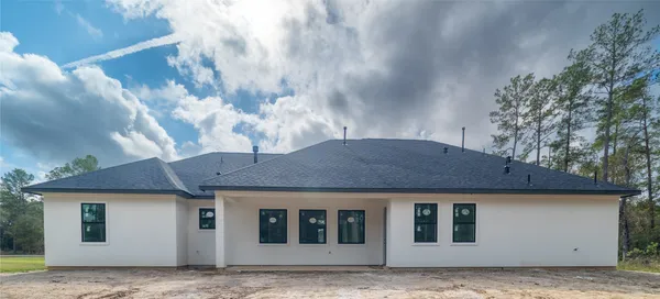 a house view with a outdoor space