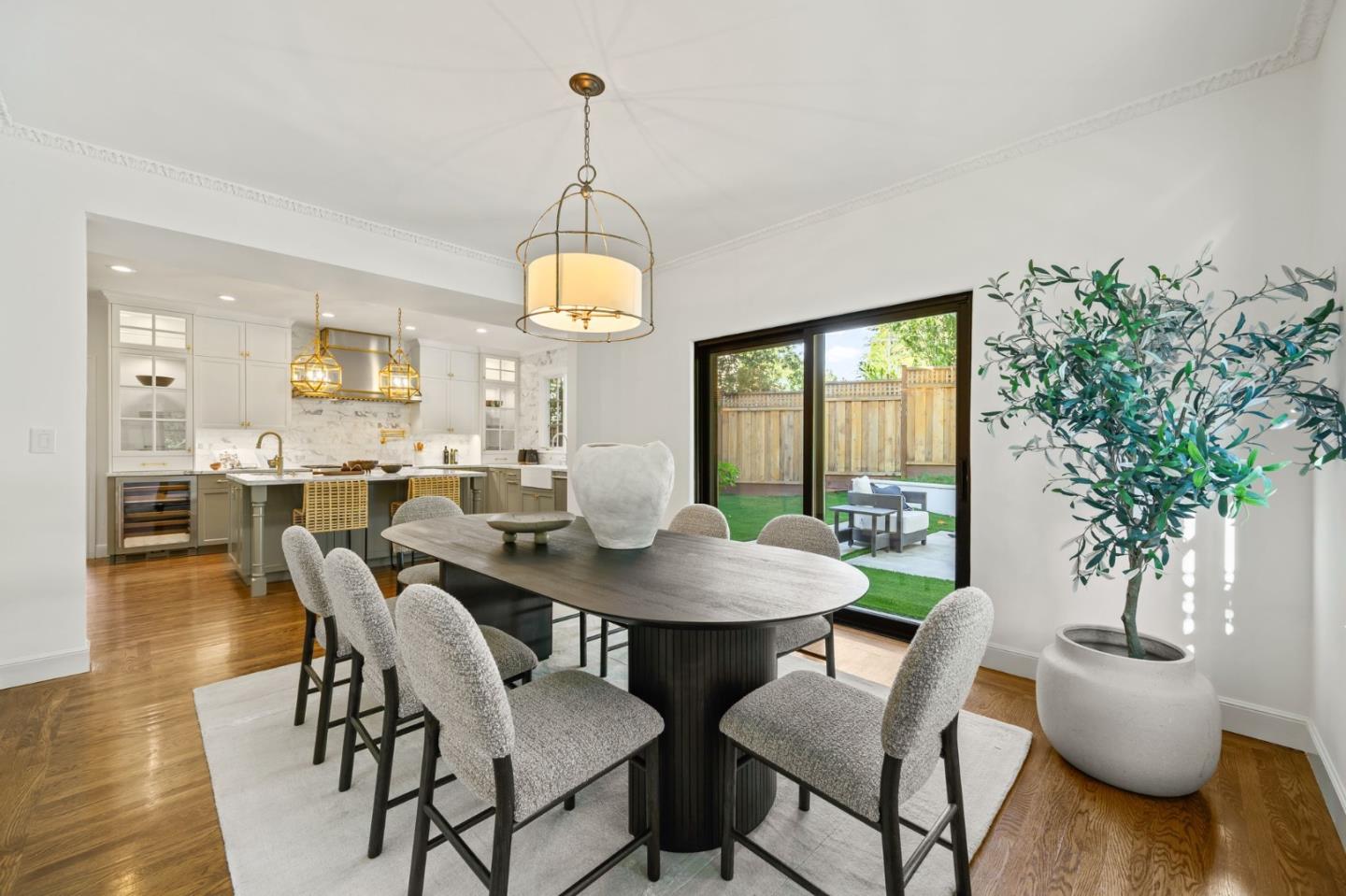 670 Edgewood Road San Mateo, CA 94402 - Photo 13 of 59 a view of a dining room with furniture window and wooden floor