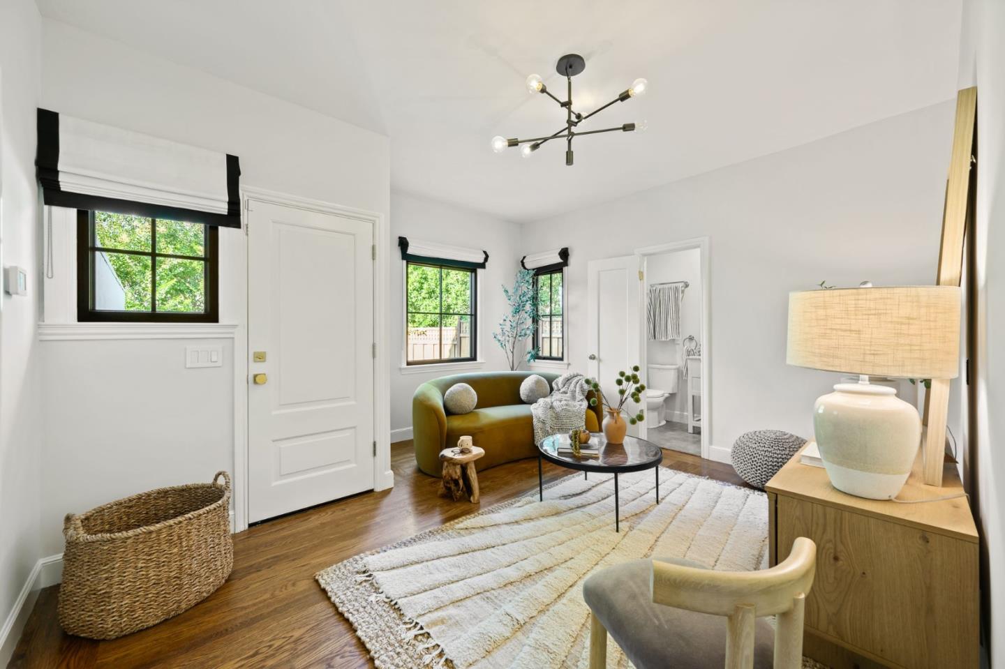 670 Edgewood Road San Mateo, CA 94402 - Photo 14 of 59 a living room with furniture and wooden floor