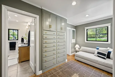 a view of balcony with furniture