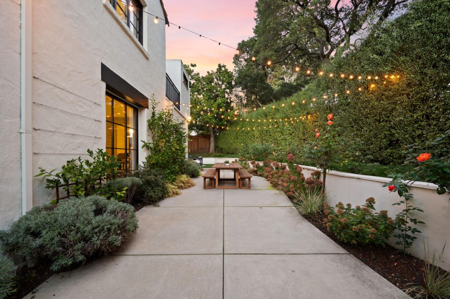 670 Edgewood Road San Mateo, CA 94402 - Photo 46 of 59 a view of a patio with couches table and chairs and potted plants
