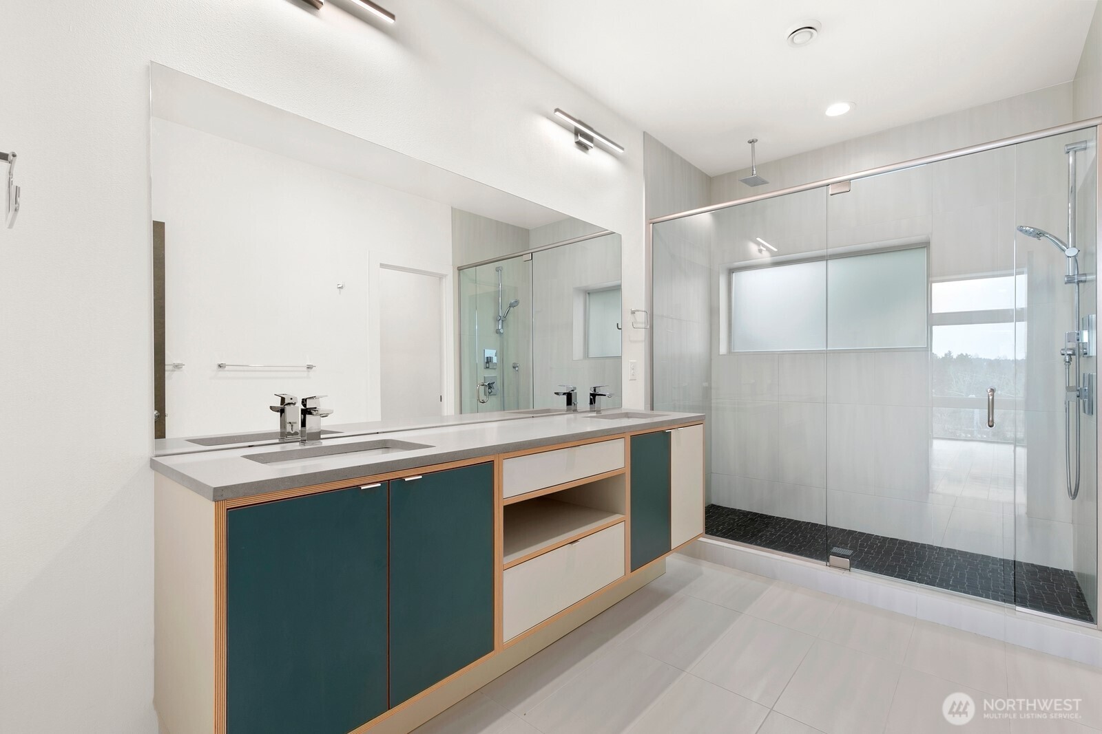3527 South Oregon Street Seattle, WA 98118 - Photo 11 of 24 a bathroom with a sink and a mirror