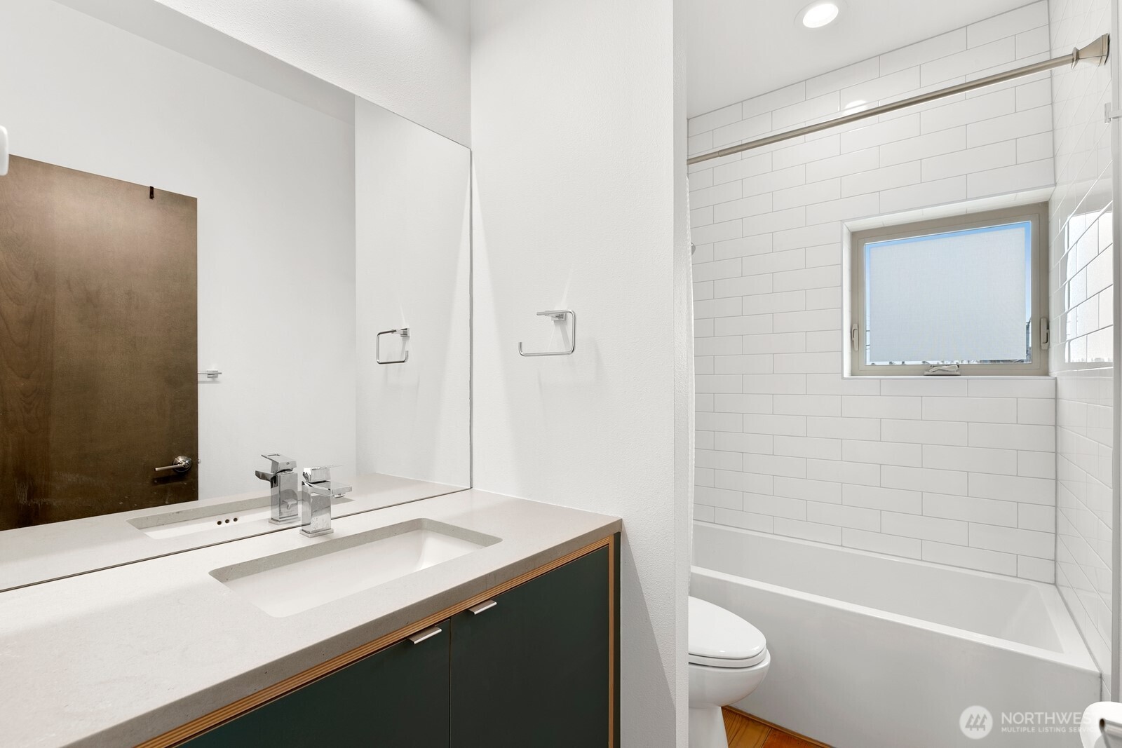 3527 South Oregon Street Seattle, WA 98118 - Photo 13 of 24 a bathroom with a sink a toilet and shower