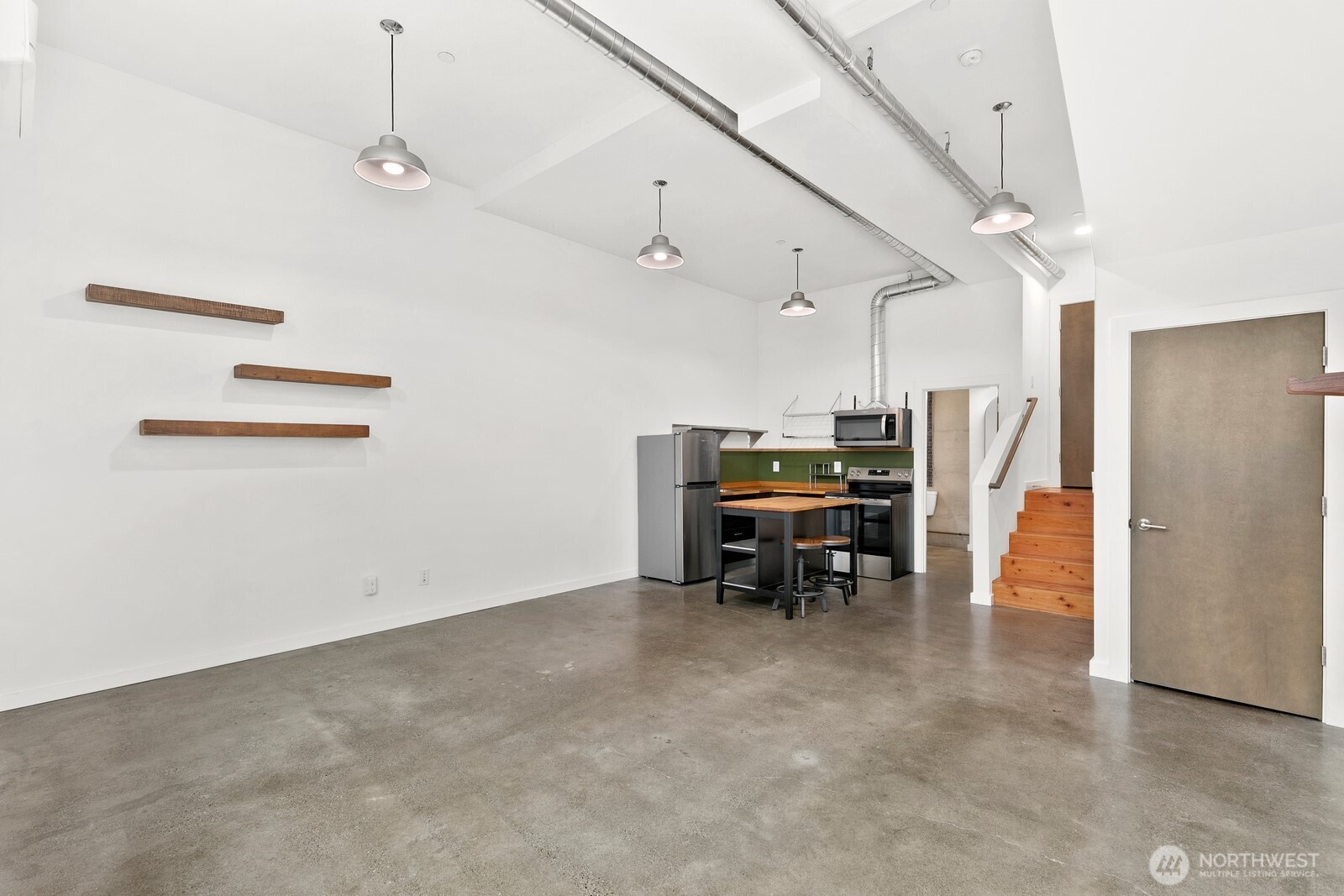 3527 South Oregon Street Seattle, WA 98118 - Photo 15 of 24 a view of work space with furniture and a projector