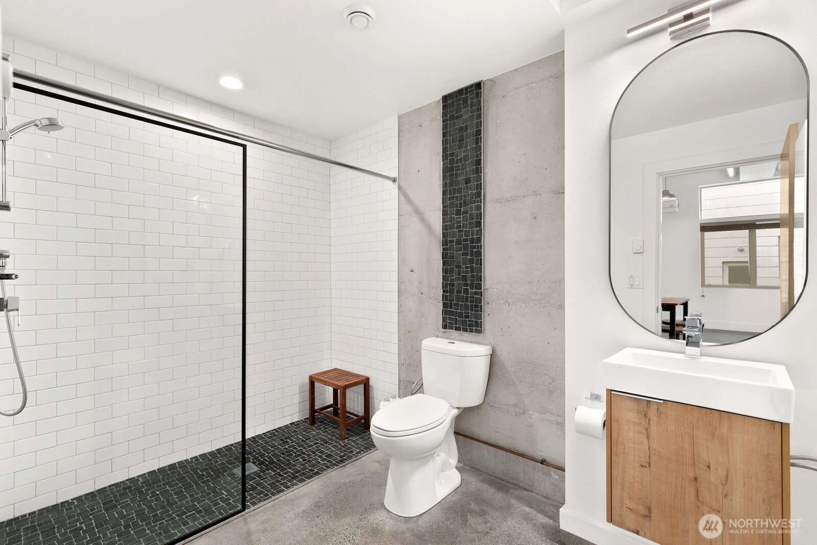 3527 South Oregon Street Seattle, WA 98118 - Photo 17 of 24 a bathroom with a toilet a sink and a mirror