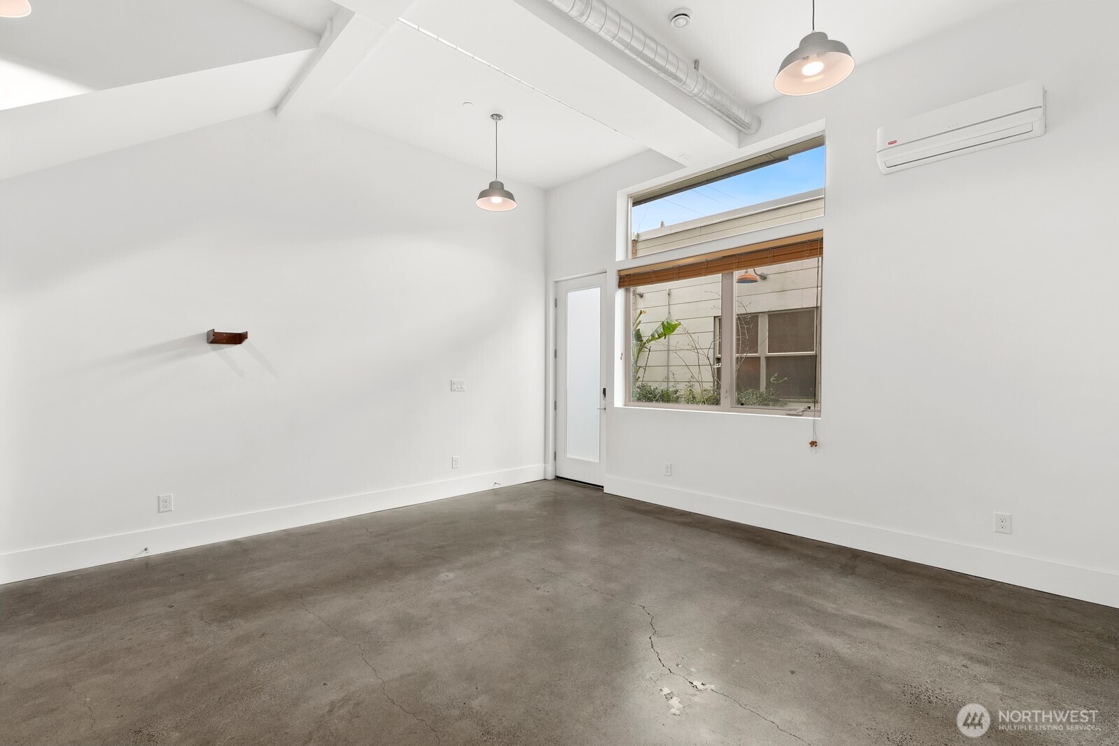 3527 South Oregon Street Seattle, WA 98118 - Photo 19 of 24 a view of an empty room with a window