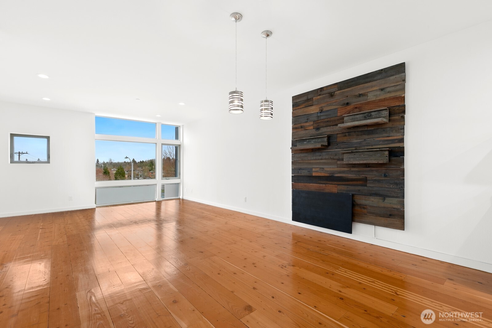 3527 South Oregon Street Seattle, WA 98118 - Photo 2 of 24 a view of an empty room with a window