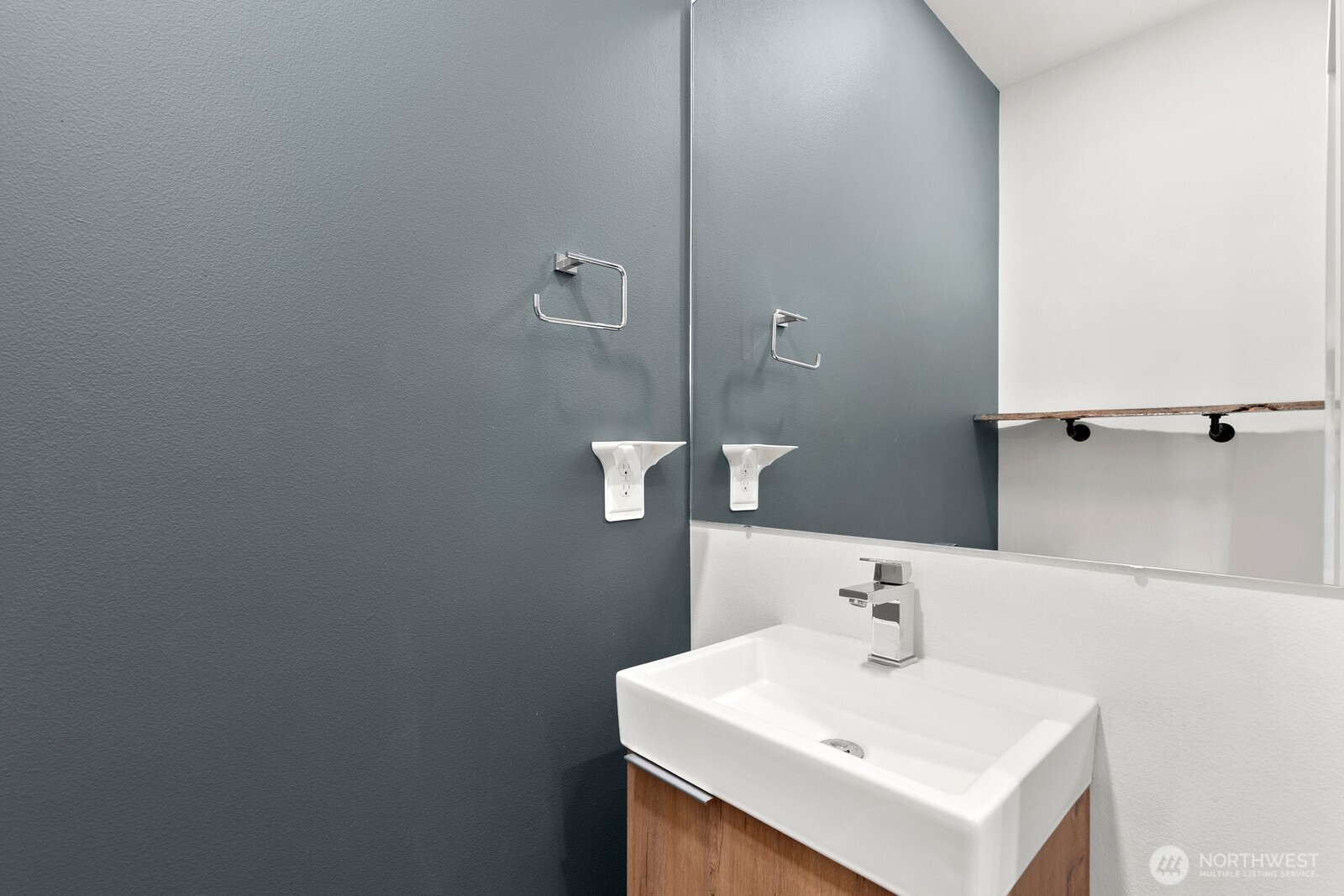 3527 South Oregon Street Seattle, WA 98118 - Photo 8 of 24 a bathroom with a sink and a mirror