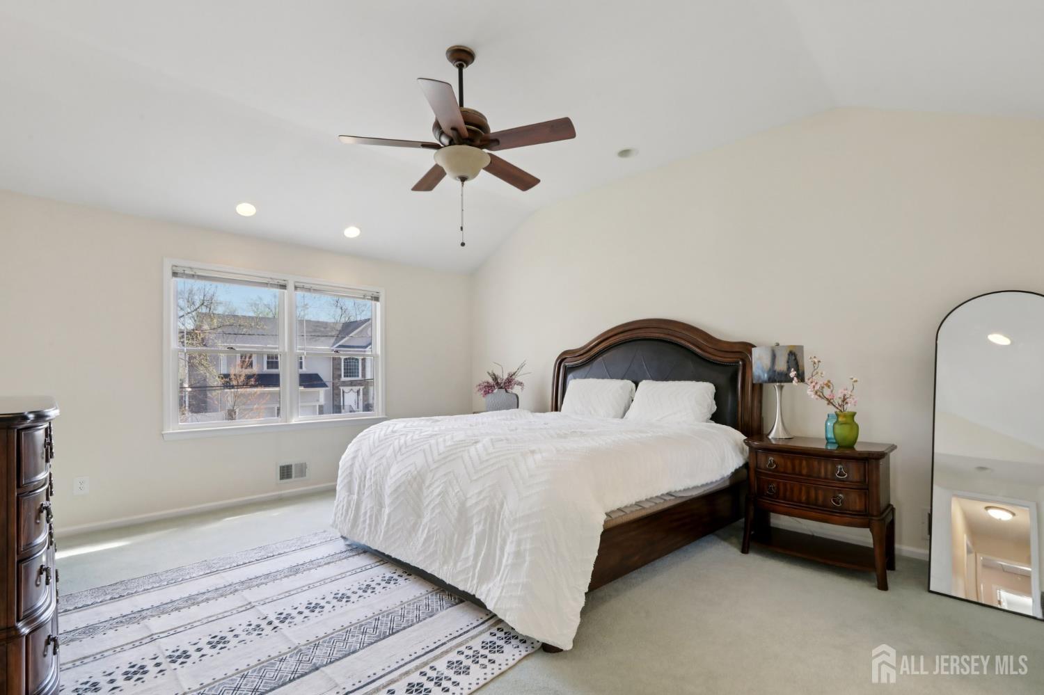 53 Salem Street Edison, NJ 08820 - Photo 18 of 39 a bedroom with a bed and a window