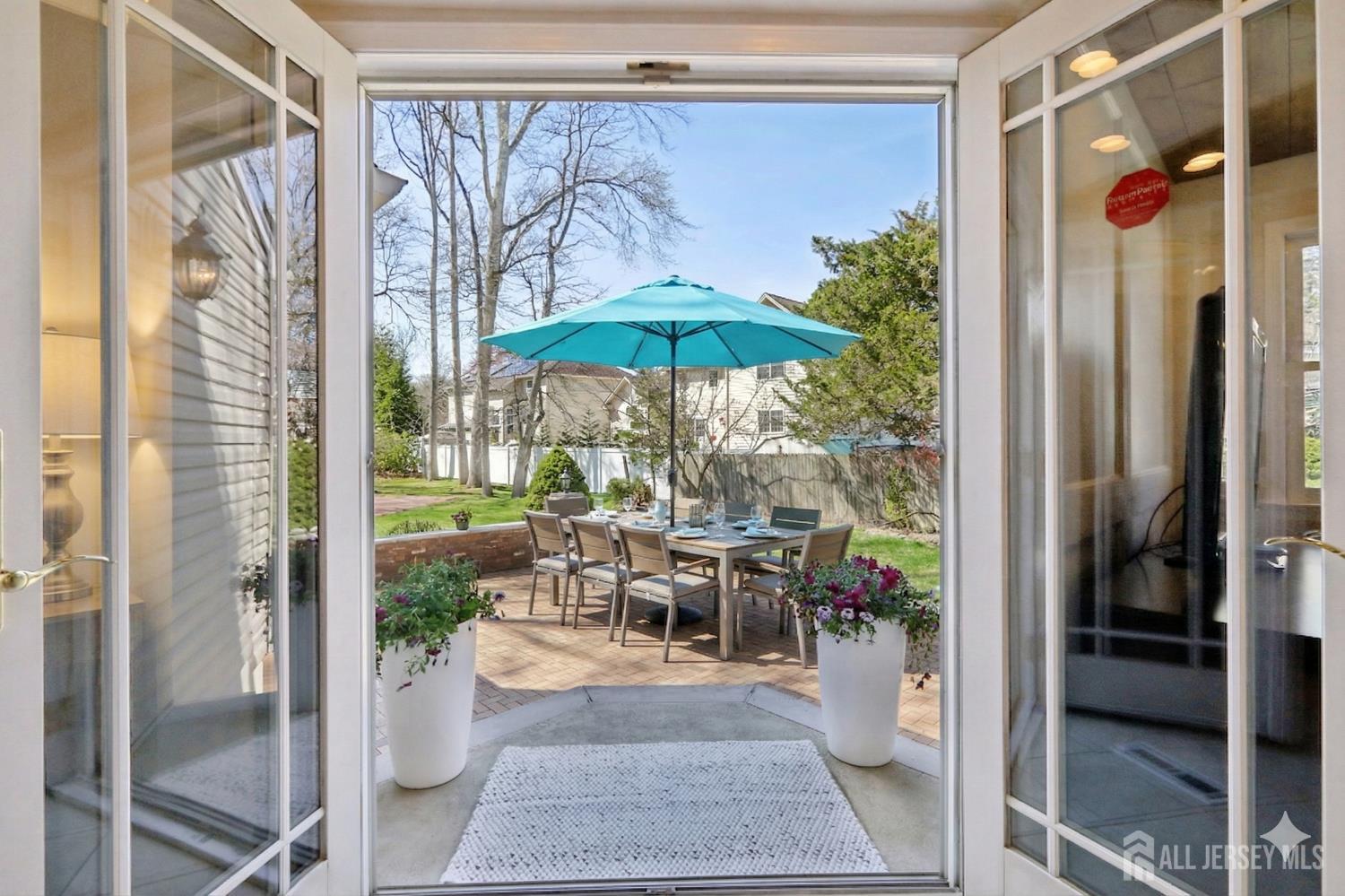 53 Salem Street Edison, NJ 08820 - Photo 39 of 39 a view of a patio with chairs and potted plants