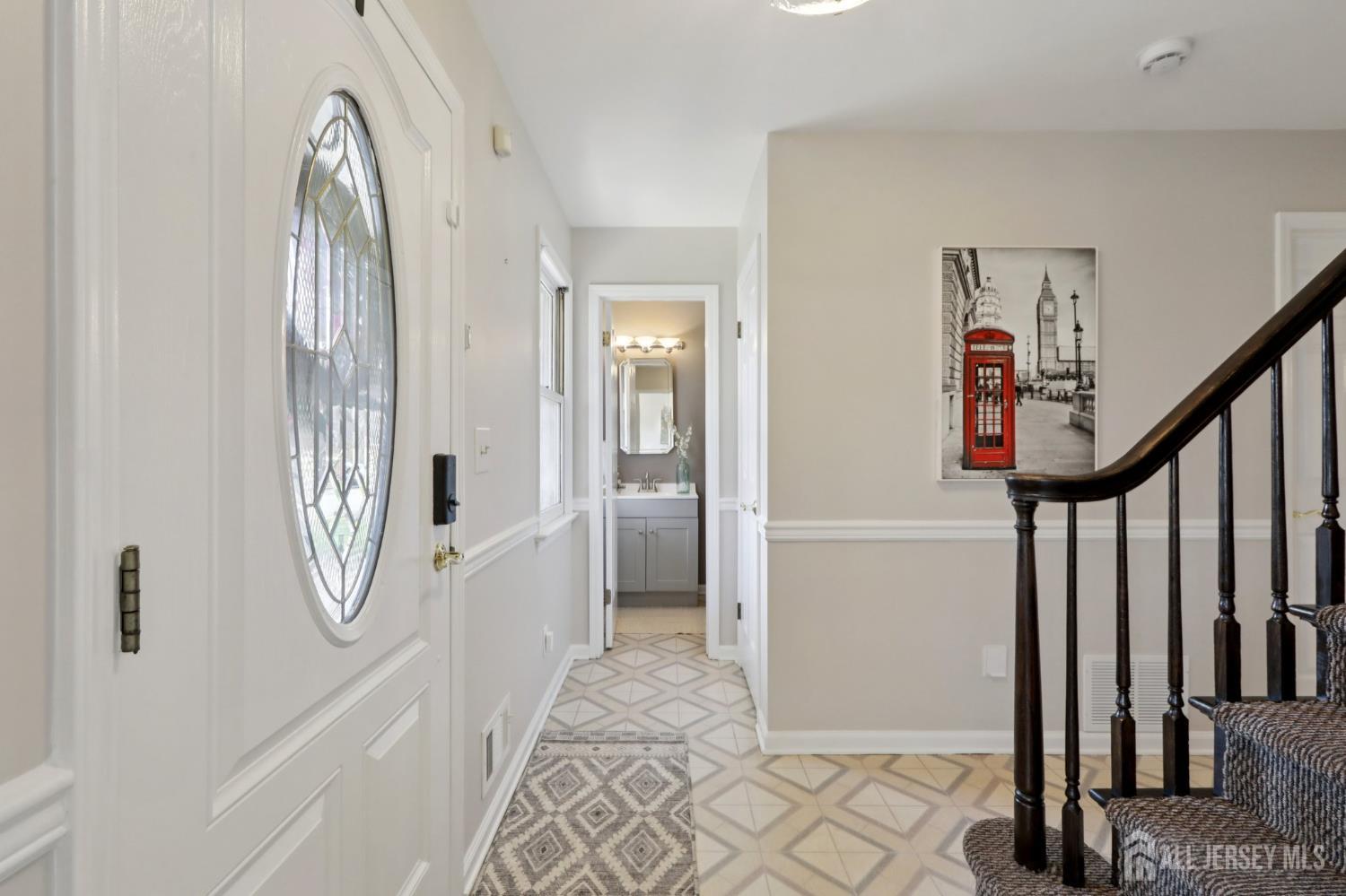 53 Salem Street Edison, NJ 08820 - Photo 4 of 39 a view of an entryway with wooden floor