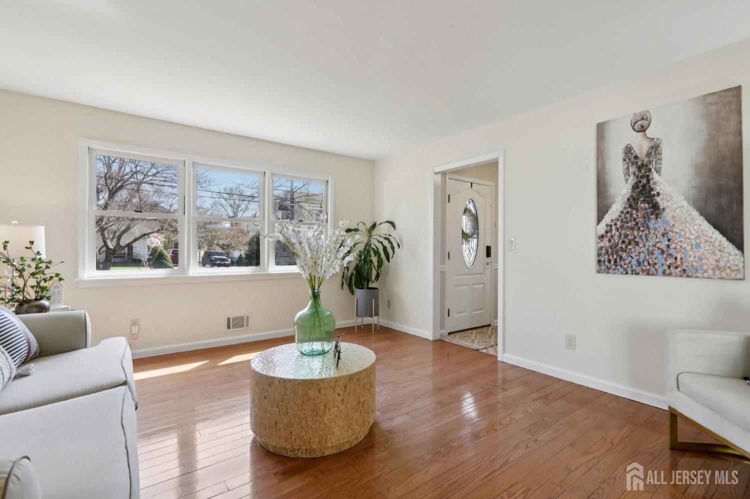 53 Salem Street Edison, NJ 08820 - Photo 6 of 39 a living room with furniture and a potted plant