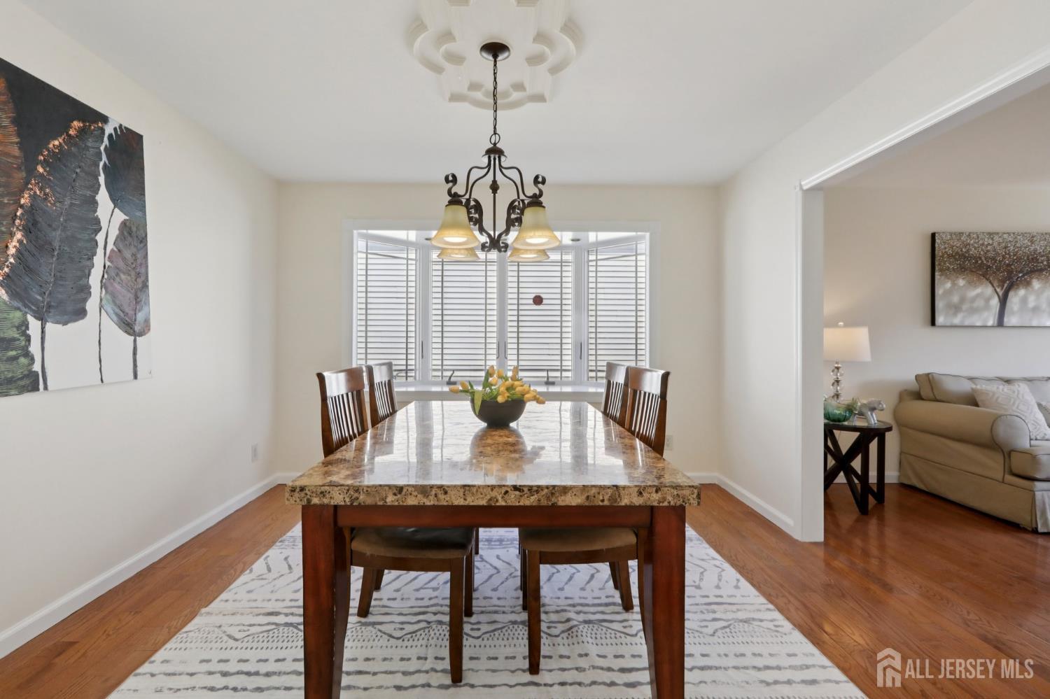 53 Salem Street Edison, NJ 08820 - Photo 10 of 39 a view of a dining room with furniture window and wooden floor