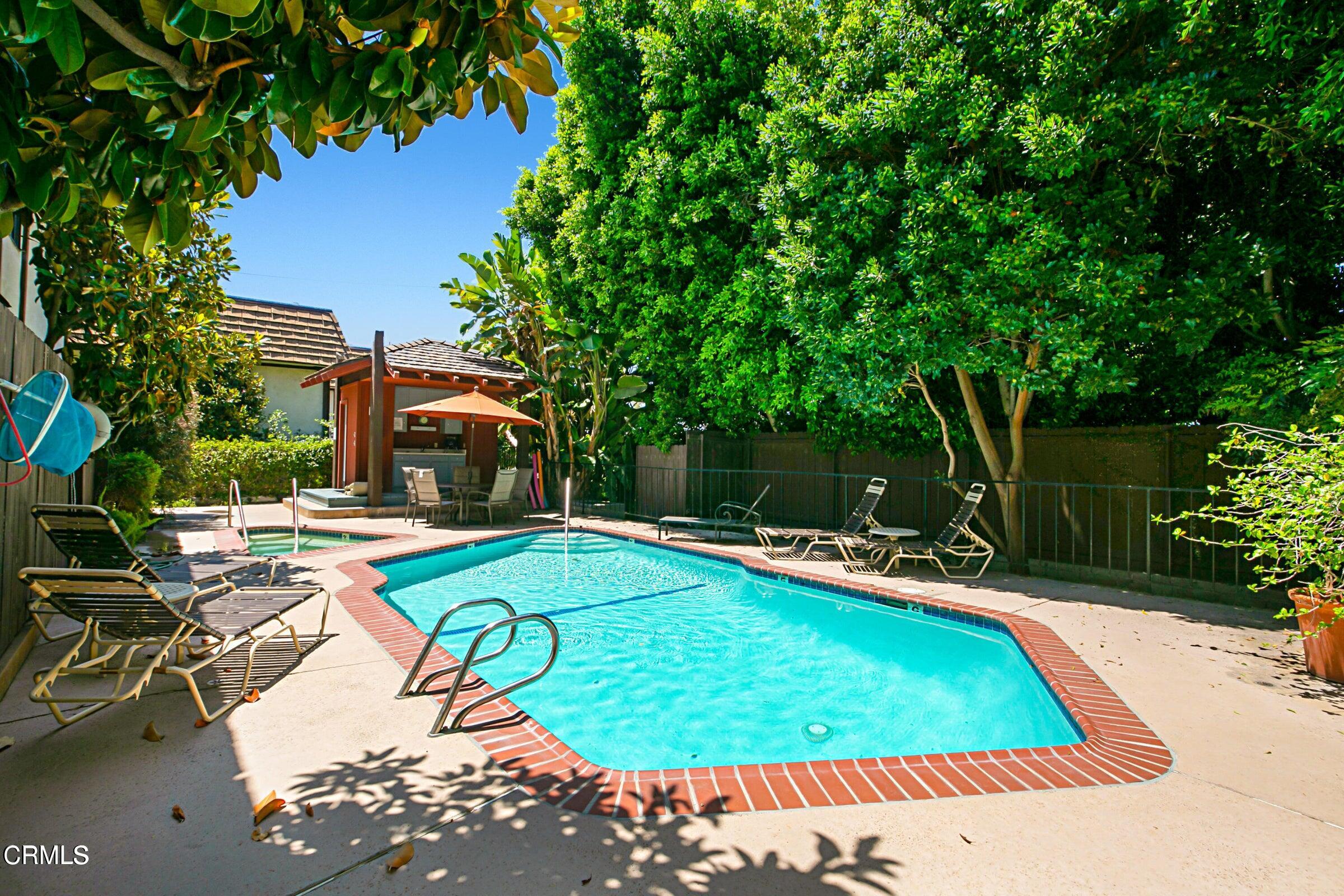 1429 Valley View Road, Unit 13 Glendale, CA 91202 - Photo 27 of 29 a view of a swimming pool with lounge chair