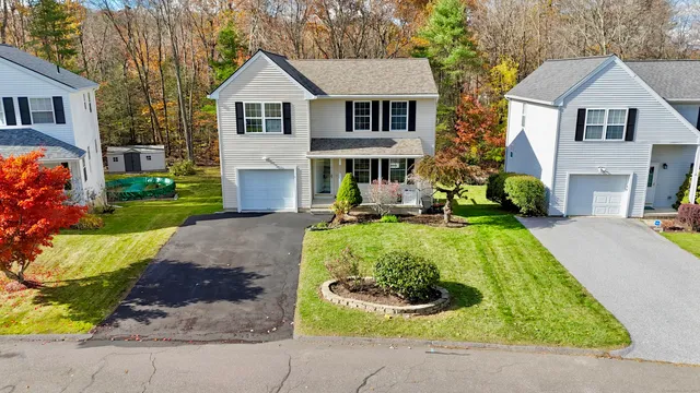 front view of a house with a yard