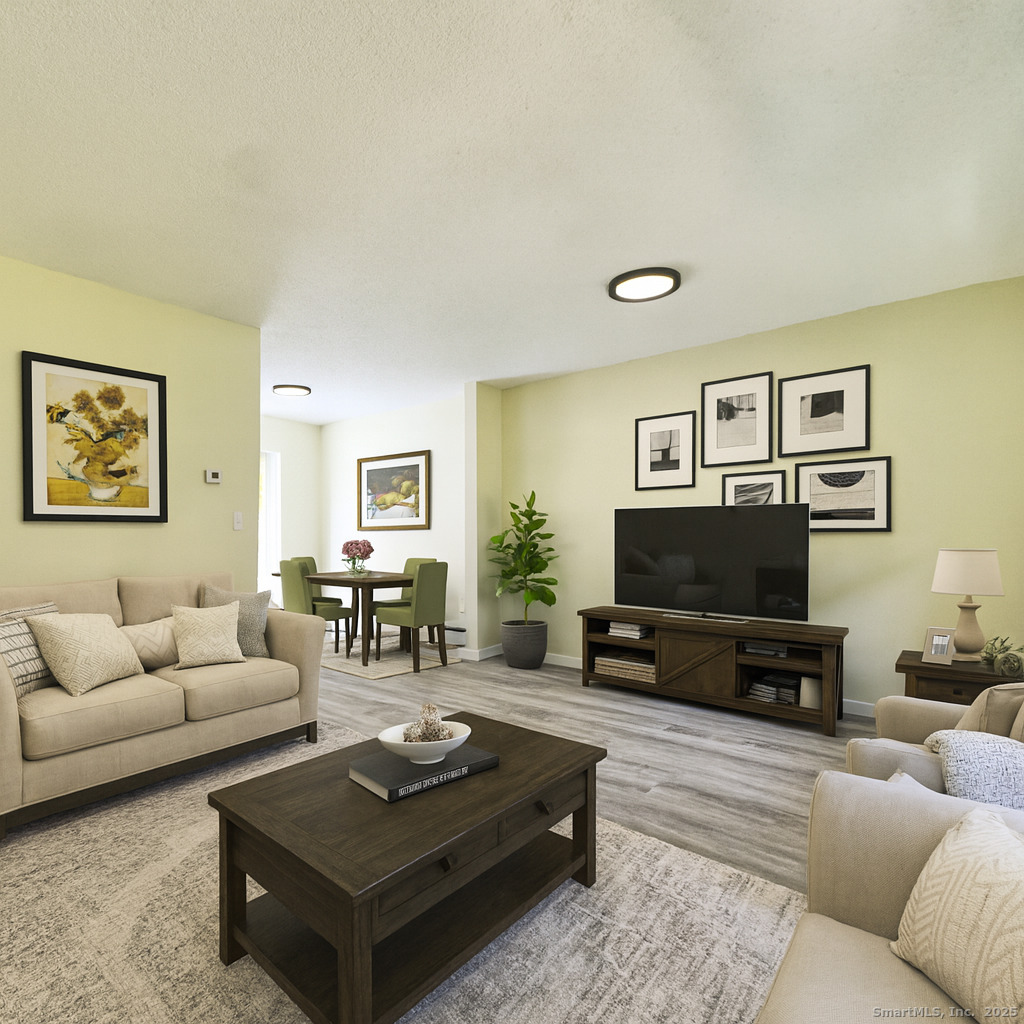 109 Winterberry Way Torrington, CT 06790 - Photo 4 of 22 a living room with furniture and a flat screen tv