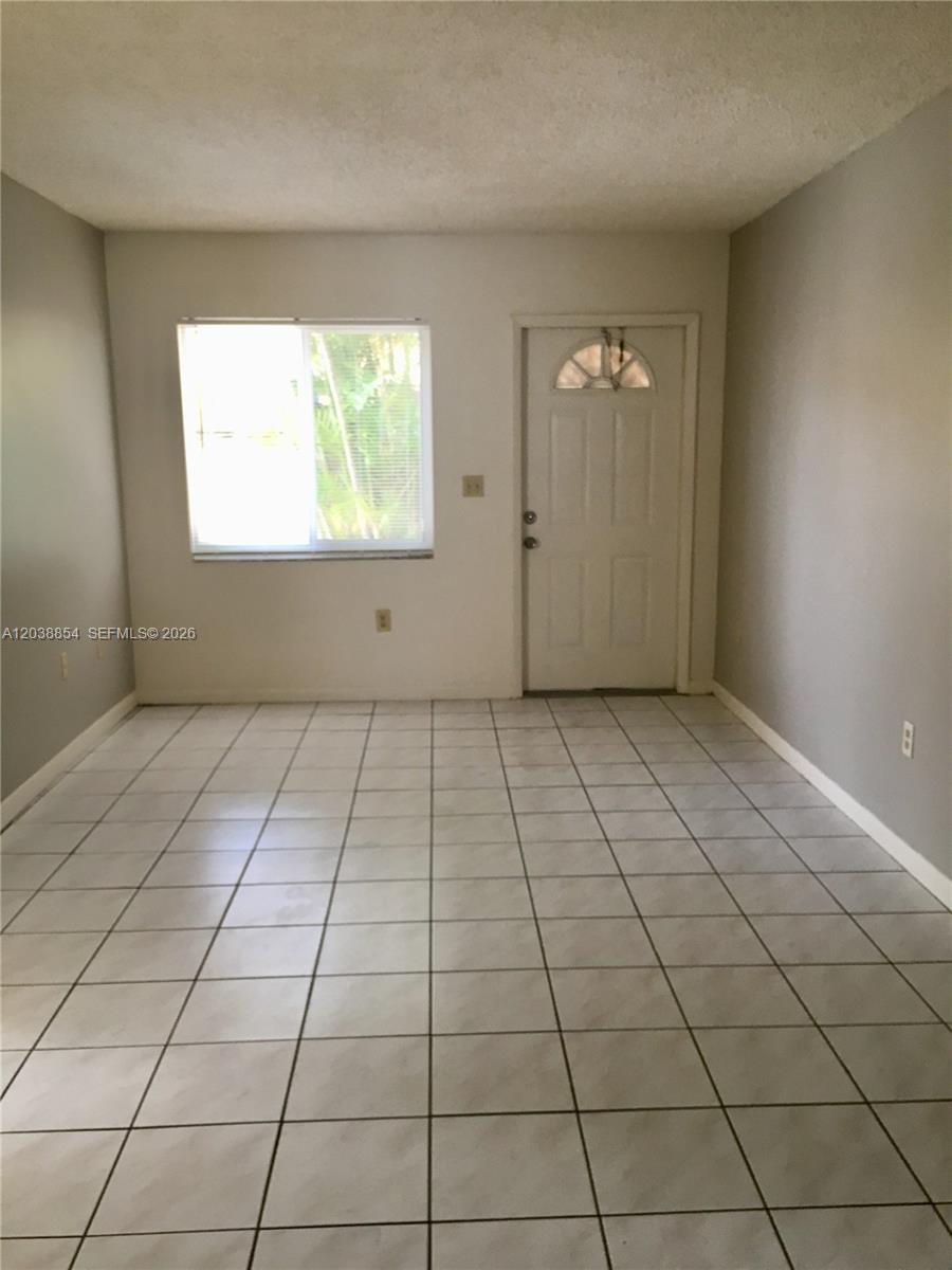 1419 Southwest 22nd Avenue Miami, FL 33145 - Photo 19 of 20 an empty room with windows