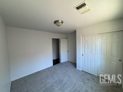Undisclosed Address Bakersfield, CA 93313 - Photo 3 of 7 an empty room with a empty space and windows