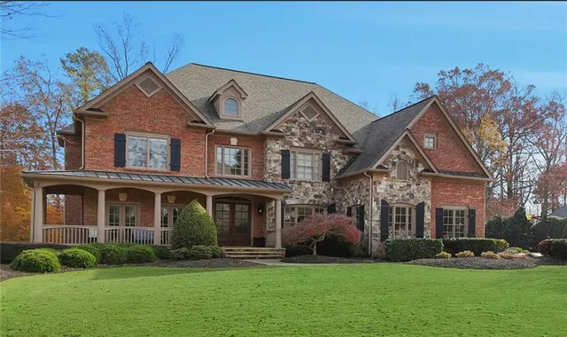 front view of a house with a yard