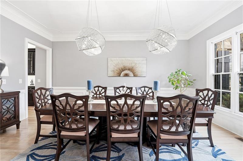 170 Golf Link View Milton, GA 30004 - Photo 13 of 54 a view of a dining room with furniture a chandelier and wooden floor