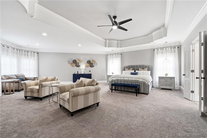 170 Golf Link View Milton, GA 30004 - Photo 29 of 54 a bedroom with furniture and a chandelier