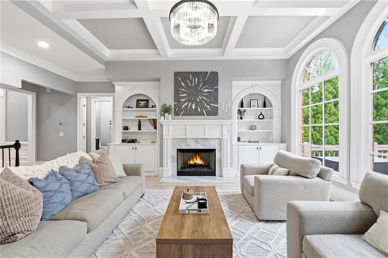 170 Golf Link View Milton, GA 30004 - Photo 3 of 54 a living room with furniture a fireplace and a large window