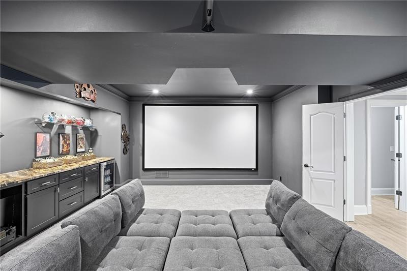 170 Golf Link View Milton, GA 30004 - Photo 42 of 54 a living room with furniture and a flat screen tv