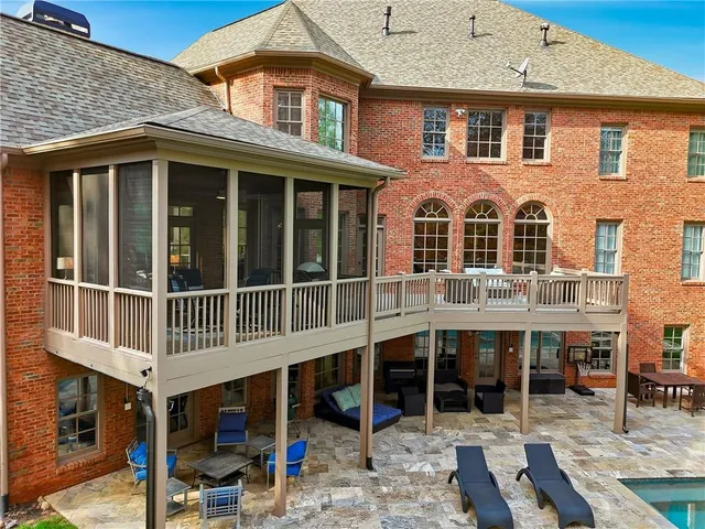 a front view of a house with glass windows
