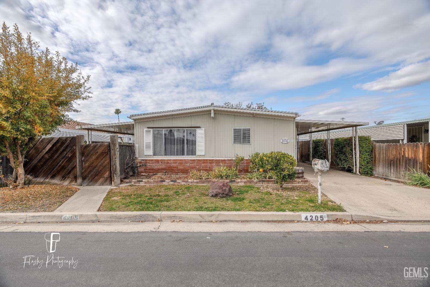 a view of a house with a garden